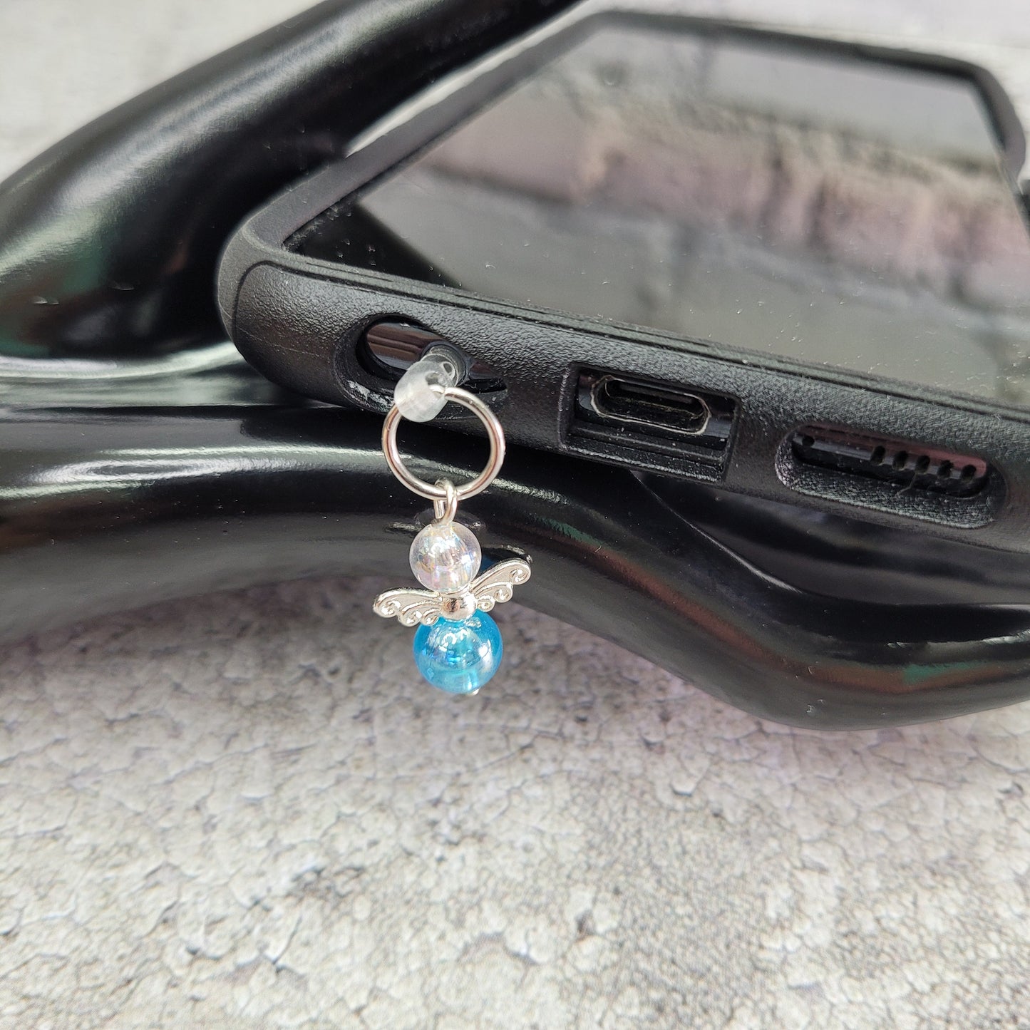 Pendentif ange pour cellulaire sur bouchon anti-poussière