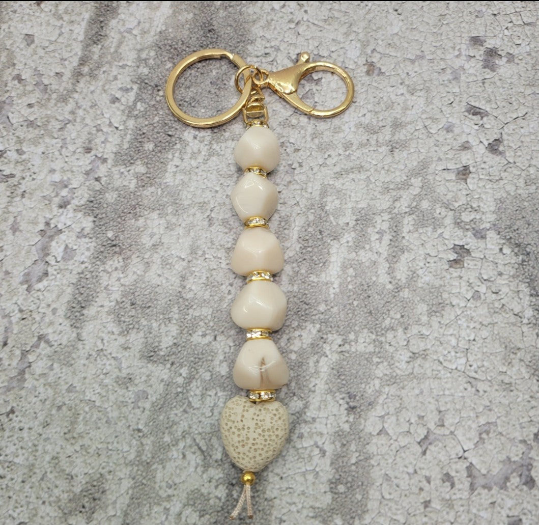 Porte-clés, parure de sac à main, diffuseur d'huiles essentielles.