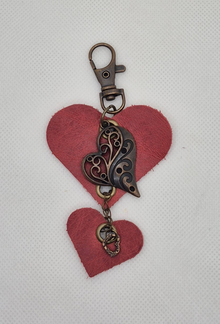 Parure coeurs en cuir rouge