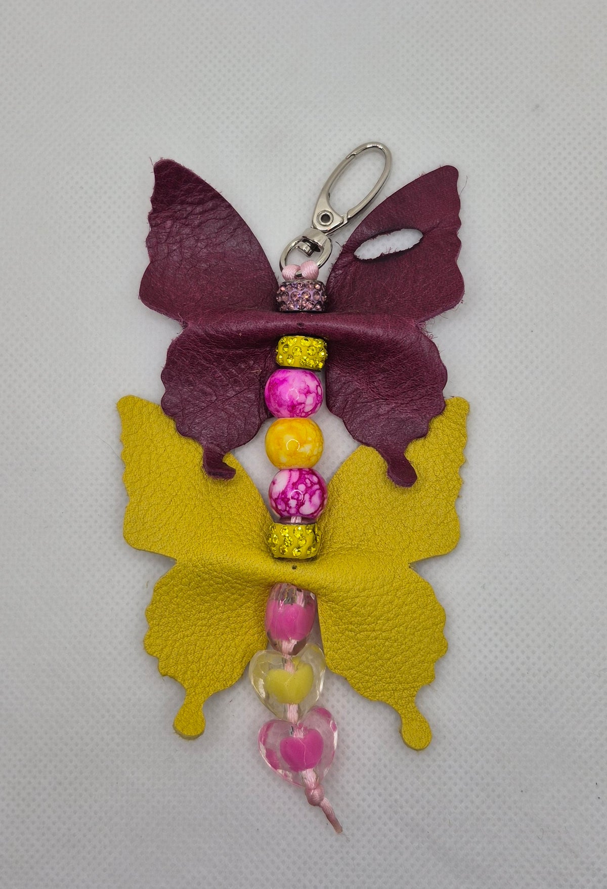 Parure en cuir avec 2 papillons