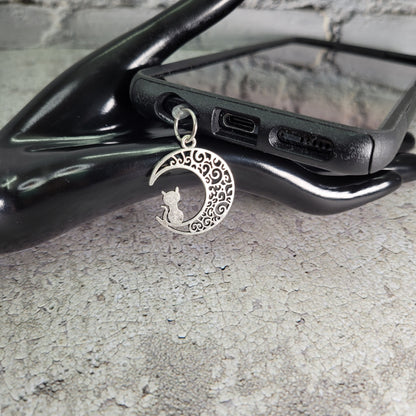 Pendentif pour cellulaire sur bouchon anti-poussière