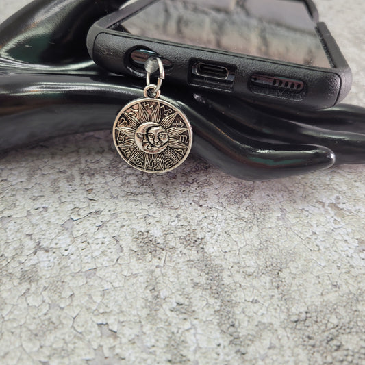 Pendentif pour cellulaire sur bouchon anti-poussière