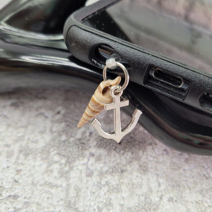 Pendentif pour cellulaire sur bouchon anti-poussière