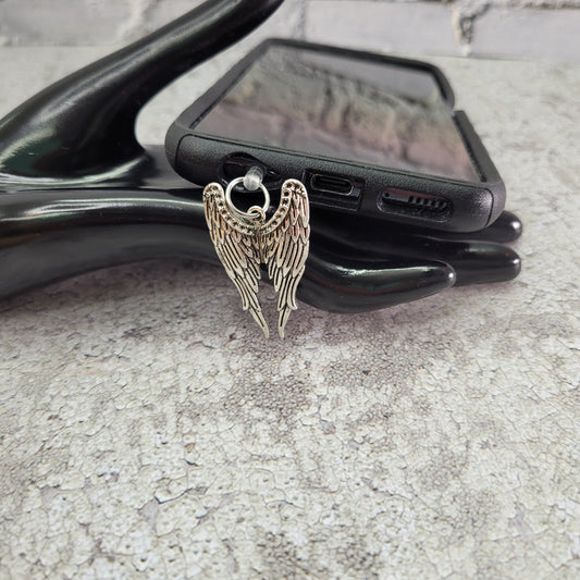 Pendentif pour cellulaire sur bouchon anti-poussière
