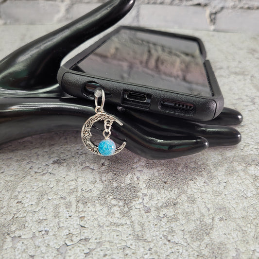 Pendentif pour cellulaire sur bouchon anti-poussière