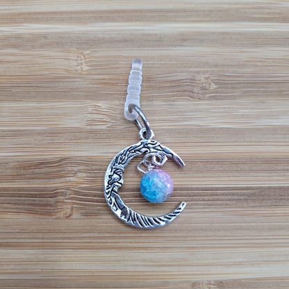Pendentif pour cellulaire sur bouchon anti-poussière