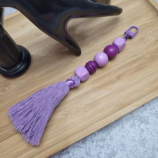 Bijou/porte-clés fait en perles de bois