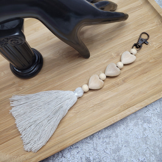 Bijou/porte-clés fait en perles de bois