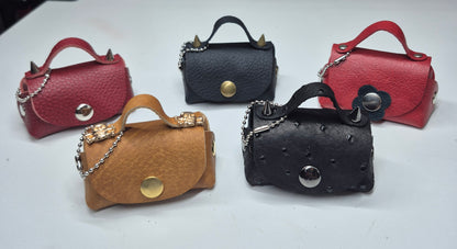 Les minis sacoches en cuir ornement pour sacoche