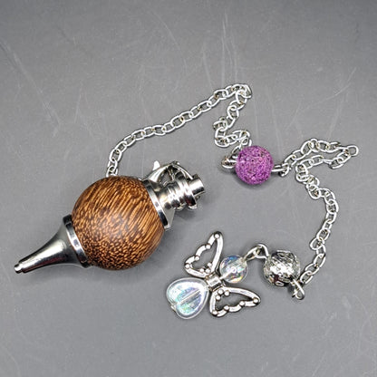 Pendule bois de sental breloque ange