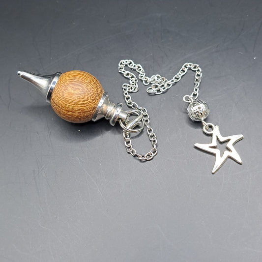 Pendule bois de sental breloque étoile de mer