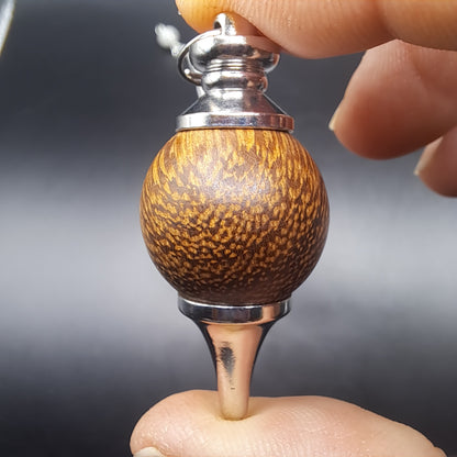 Pendule bois de sental breloque étoile de mer