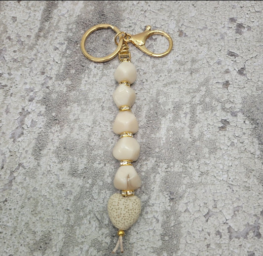 Porte-clés, parure de sac à main, diffuseur d'huiles essentielles.