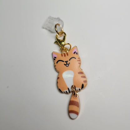 Pendentif pour cellulaire sur bouchon anti-poussière