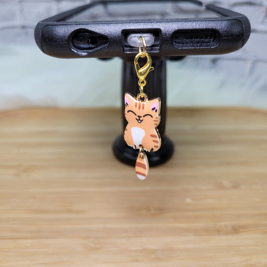 Pendentif pour cellulaire sur bouchon anti-poussière