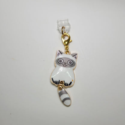 Pendentif pour cellulaire sur bouchon anti-poussière