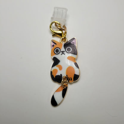 Pendentif pour cellulaire sur bouchon anti-poussière
