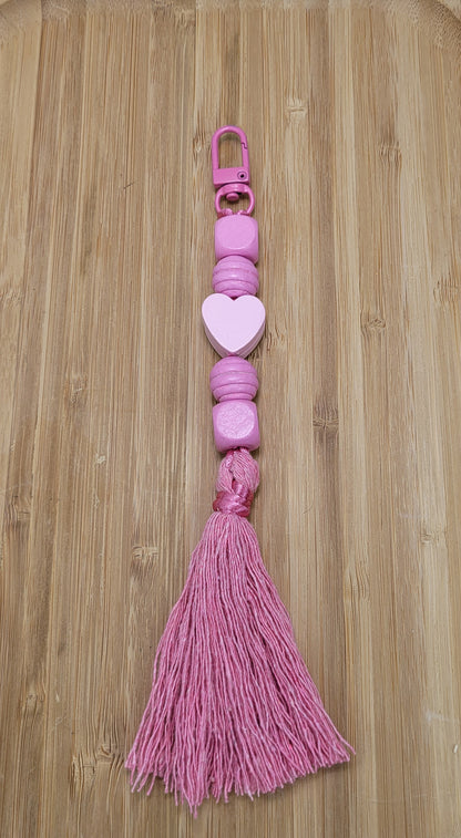 Bijou/porte-clés fait en perles de bois