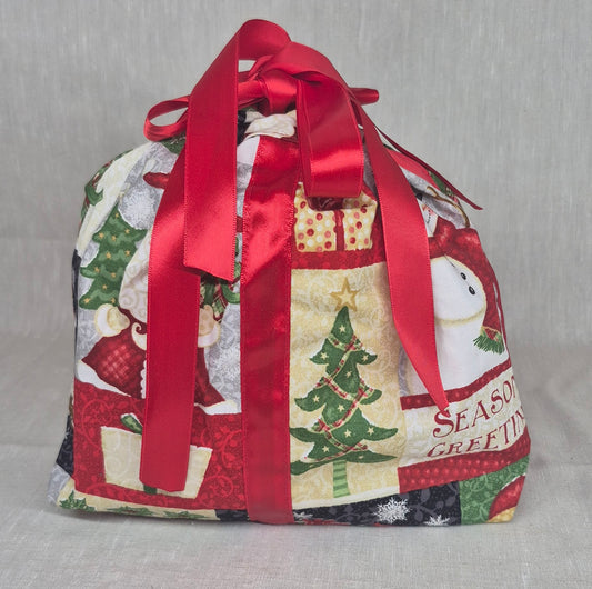 Sac cadeau en tissu avec son ruban/boucle