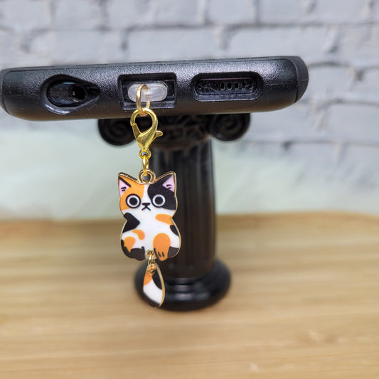 Pendentif pour cellulaire sur bouchon anti-poussière