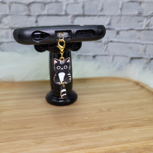 Pendentif pour cellulaire sur bouchon anti-poussière