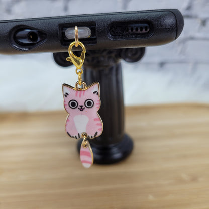 Pendentif pour cellulaire sur bouchon anti-poussière
