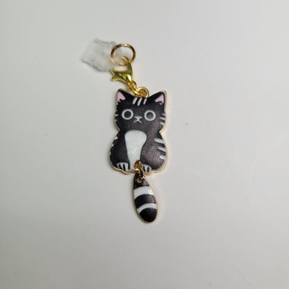 Pendentif pour cellulaire sur bouchon anti-poussière